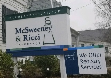 McSweeney & Ricci Insurance Agency sign and in house registry services sign