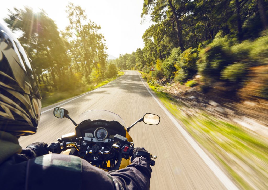 man riding motorcycle motorcycle insurance in Massachusetts